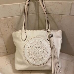 BRIGHTON FERRARA GABRIELLA WINTER WHITE MEDALLION TASSELED TOTE
